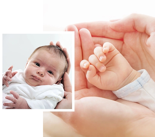 A baby is in its mother 's hands and the picture of it is taken from above.