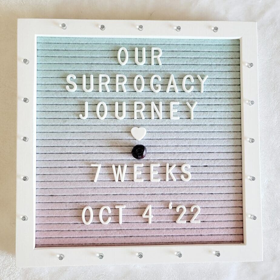 A sign that says our surrogacy journey 7 weeks oct 4 th 2 0 2 2